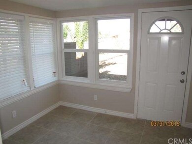 sunny breakfast room, this door leads to side yard