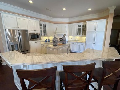 Kitchen features marble countertops