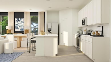 Kitchen featuring appliances with stainless steel 