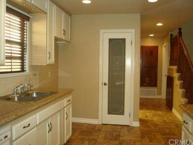 Check out the glass door pantry! Down the hall to 