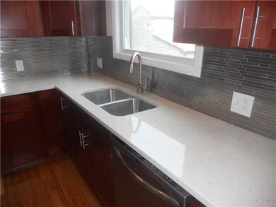 Kitchen. Counter close-up.  The tiled backsplash s