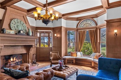 Parlor with handmade Terracotta fireplace and coffered ceilings