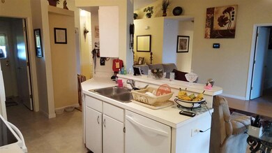 Kitchen overlooks living room