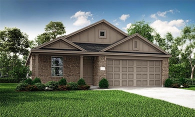 View of front facade featuring driveway, an attach