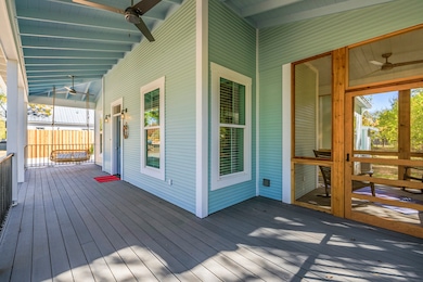 Huge wrap-around porch with swing and screened in