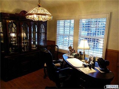Dinning room. Seller is using it as an office