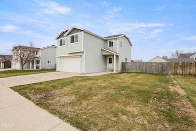 1803 25th St W, Williston, ND 58801 - photo 2