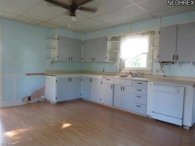 View of 15'x 13' kitchen with laminate floor and b