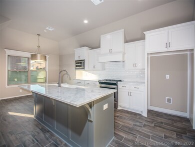 Beautiful White Cabinetry, marble countertops and