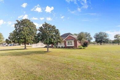 View of the home as you come up the private drive.