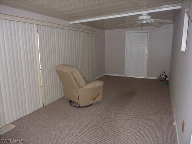 
Florida room with floor to ceiling vinyl wind