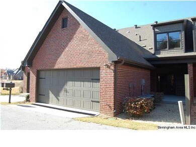 Two car garage located on back of home, access fro
