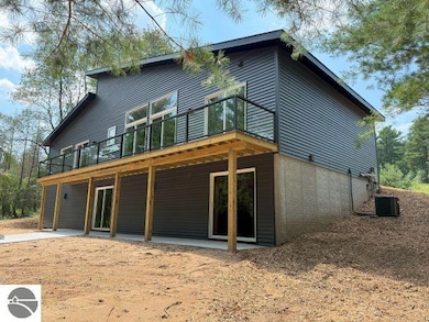 9890 Cushman Ct unit 4, Williamsburg, MI 49690 - photo 3