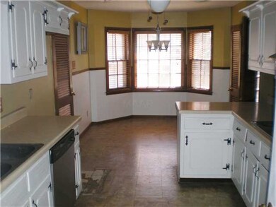 OPEN KITCHEN LEADING TO BACKYARD