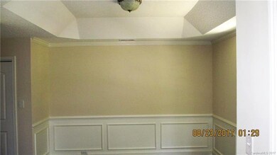 Formal Dining room with tray ceiling