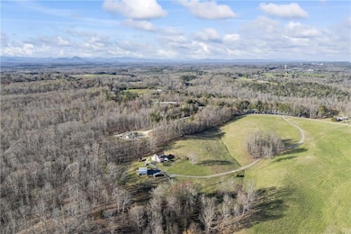 12.46 Acres of rolling pasture & privacy!
