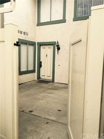 Front gate with entry to unit also contains passag