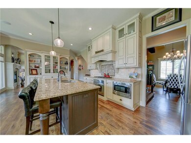 Kitchen including granite counter tops and Stainle