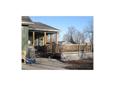 Home from the west shows the covered deck and the 