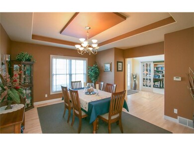 Beautiful tray ceilings accent this formal dining 