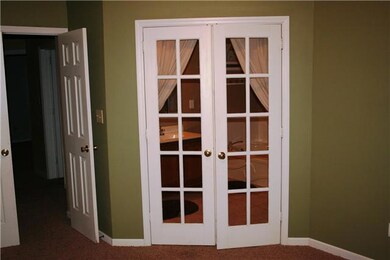 These gorgeous french doors lead to the Owners Suite bath