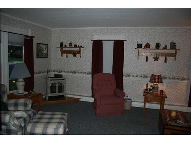 Living Room. Custom made solid wood shelving throu
