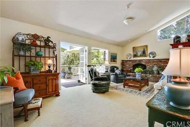 Family Room Features Handsome Brick Fireplace And 