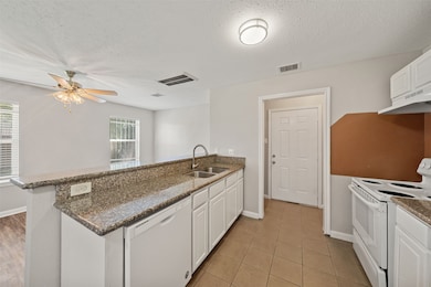 UNIT A - PHOTOS HAVE OLD STOVE & DISHWASHER - REPLACED OCT 2025