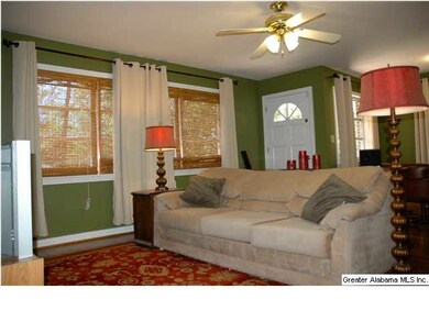 Living Room is open to Dining and Kitchen and the 