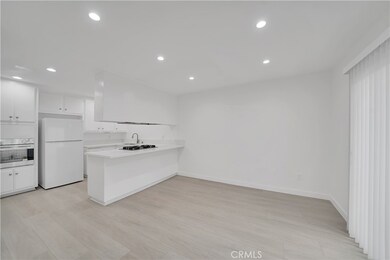 Dining room has plenty of space for table and chairs and space for barstools too!