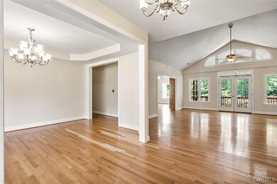 Foyer view to dining room, kitchen, great room and screened porch