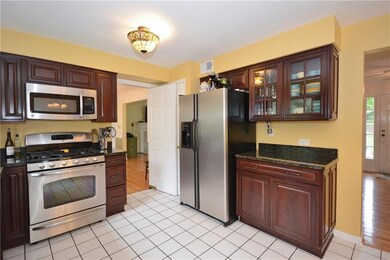Loads of cabinet space in the Kitchen.  Butler's d