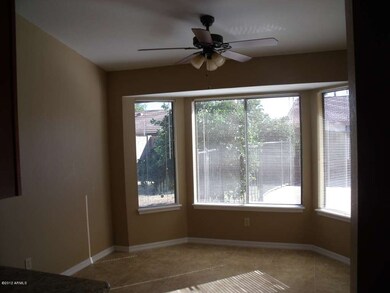 Dining area overlooks pool