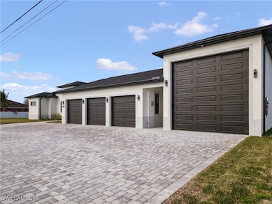 Garage with decorative driveway