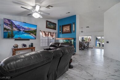 Living room featuring marble finish floor, ceiling
