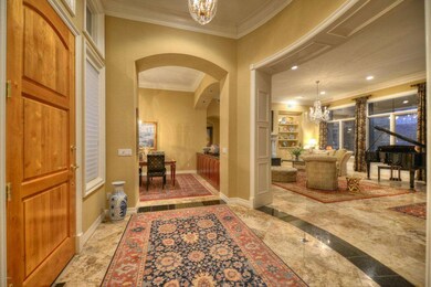 FRONT FOYER ANGLED VIEW TO LIVING RM