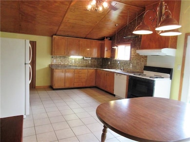 Awesome addition! Beadboard cathedral ceiling, cop