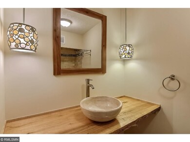 Art deco designed wood vanity and lighting