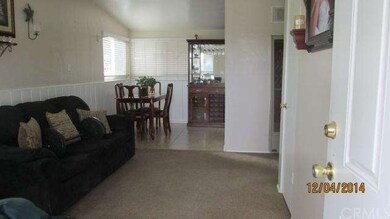 Living room with veiw of dining area. Fresh paint.