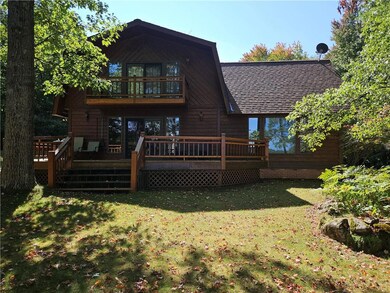 Decks overlooking the lake and nice landscaped bac