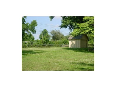 Large, level, fenced back yard with 10x12 storage 