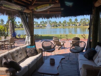 View of patio featuring a water view, a gazebo, an