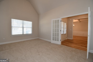 Formal Living Room or Study with Vaulted Ceiling &
