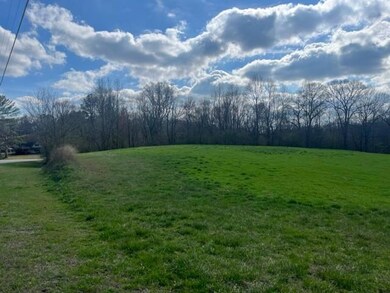 View of grassy yard featuring a view of rural / pastoral area