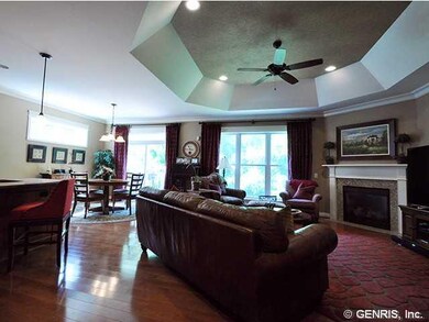 Great Room. The great room with tray ceiling is op