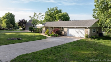 Oversized 2 car garage with plenty of parking