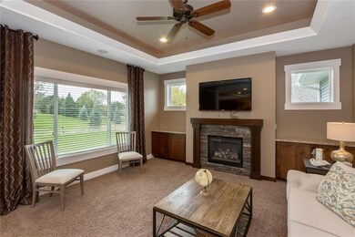 Ample sized Great Room w/lighted crown tray ceilin