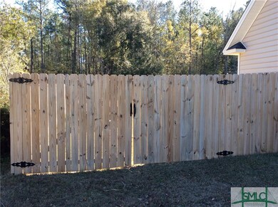 Fence has double doors.  Easy access for RV or Boa