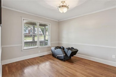 Unfurnished room featuring baseboards, visible ven
