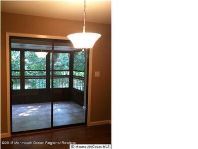 Sliding Door leads to Enclosed SunRoom